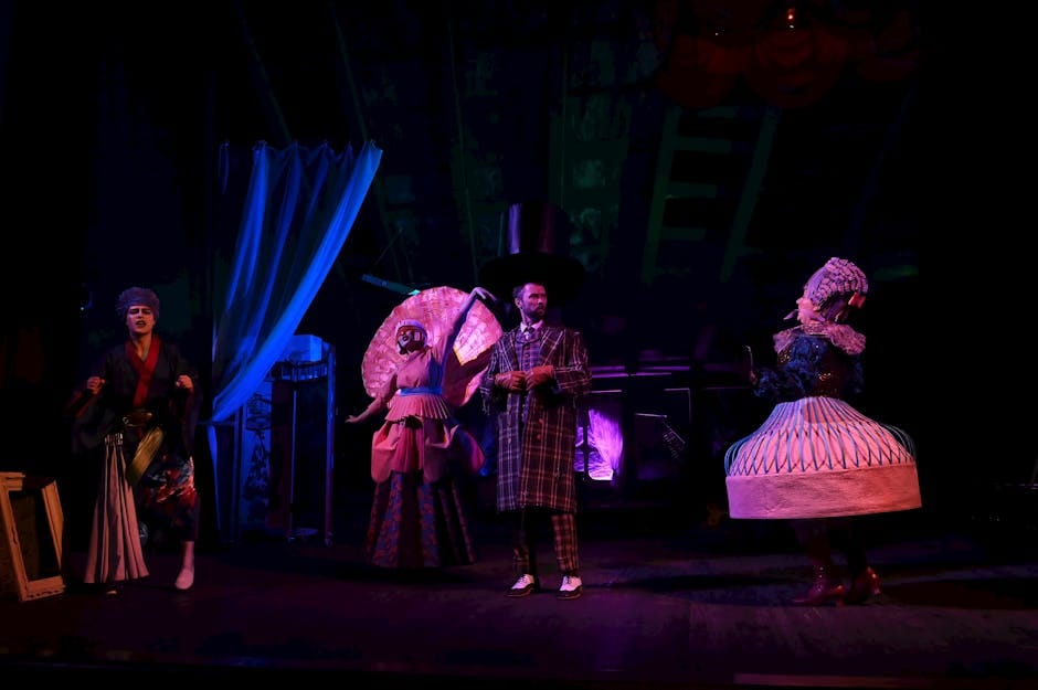 Stratford US travelers - vibrant costumes and dramatic lighting in theatrical stage scene
