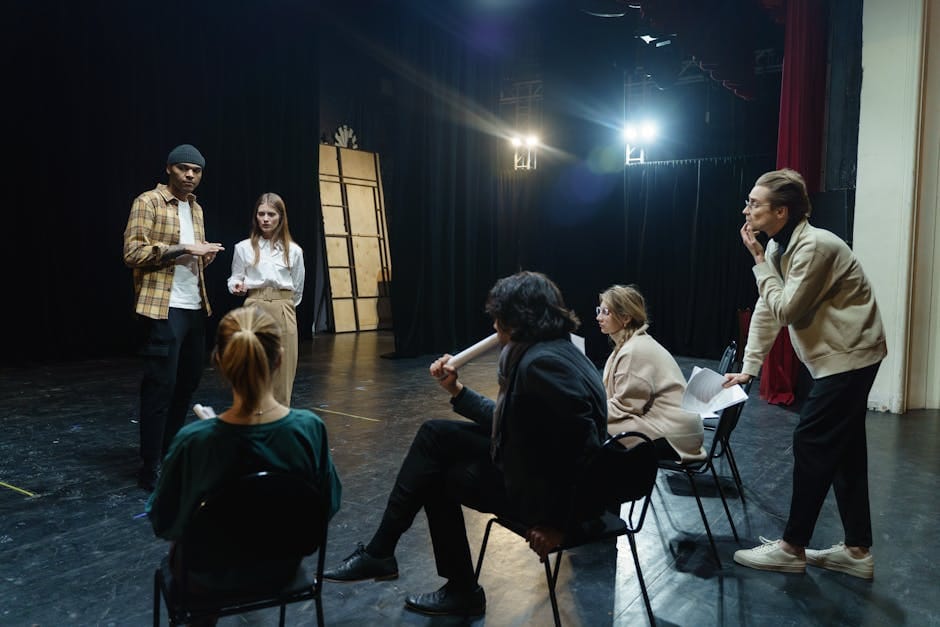 Stratford US travelers - actors rehearsing on stage with directors guidance
