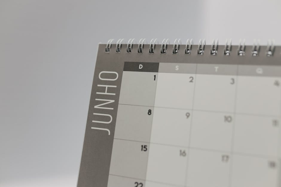 Spiral-bound calendar showing the month