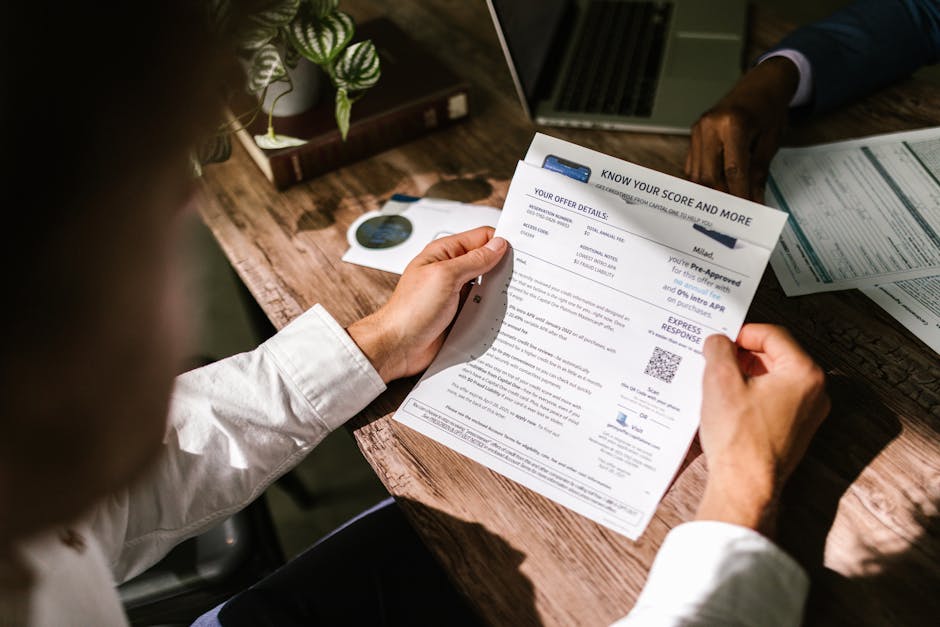 Adult examining a financial document