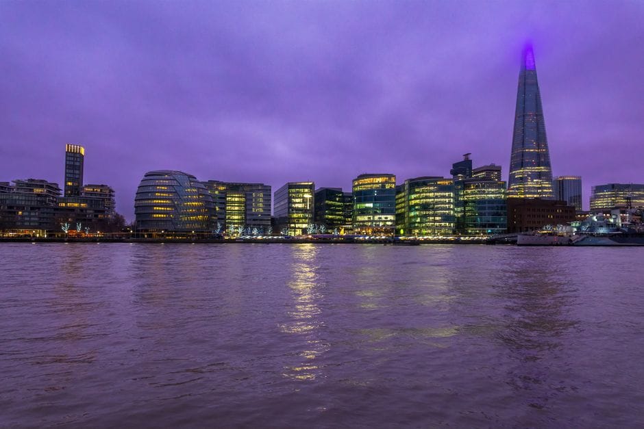 London Bridge station area beneath The Shard with commuters and city buildings