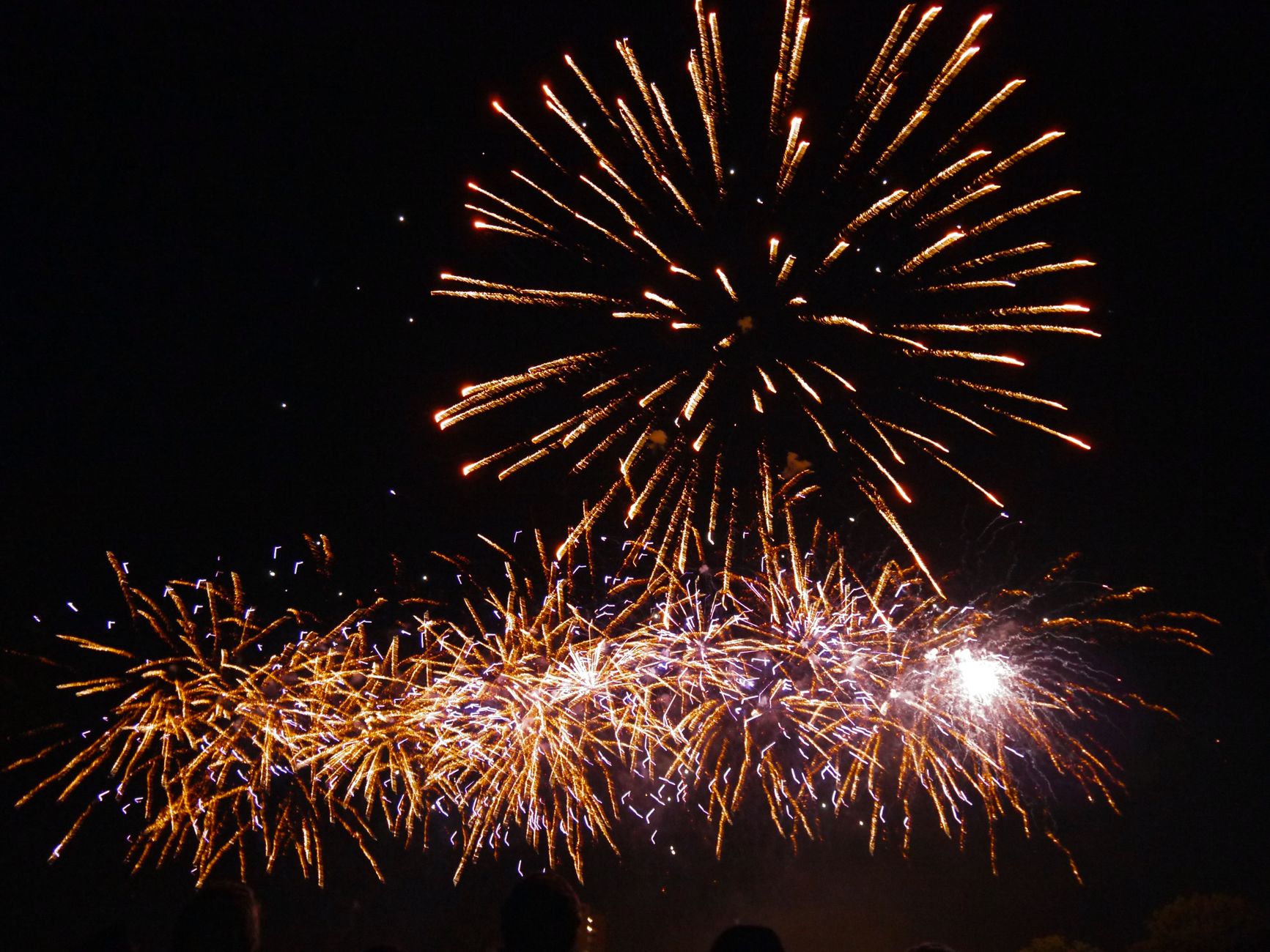 New Year's Eve fireworks bursting over the River Thames in London