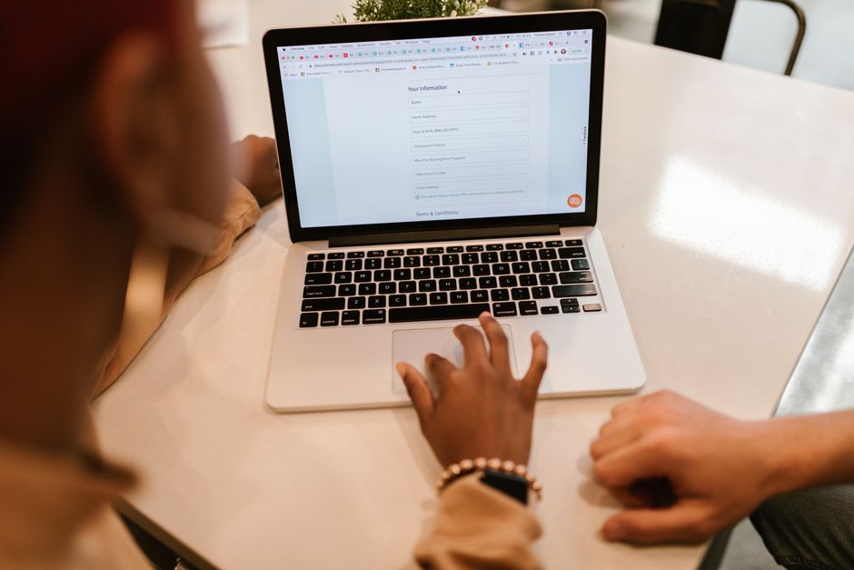 Traveler using the online UK visa checker to see if they need an ETA or visa