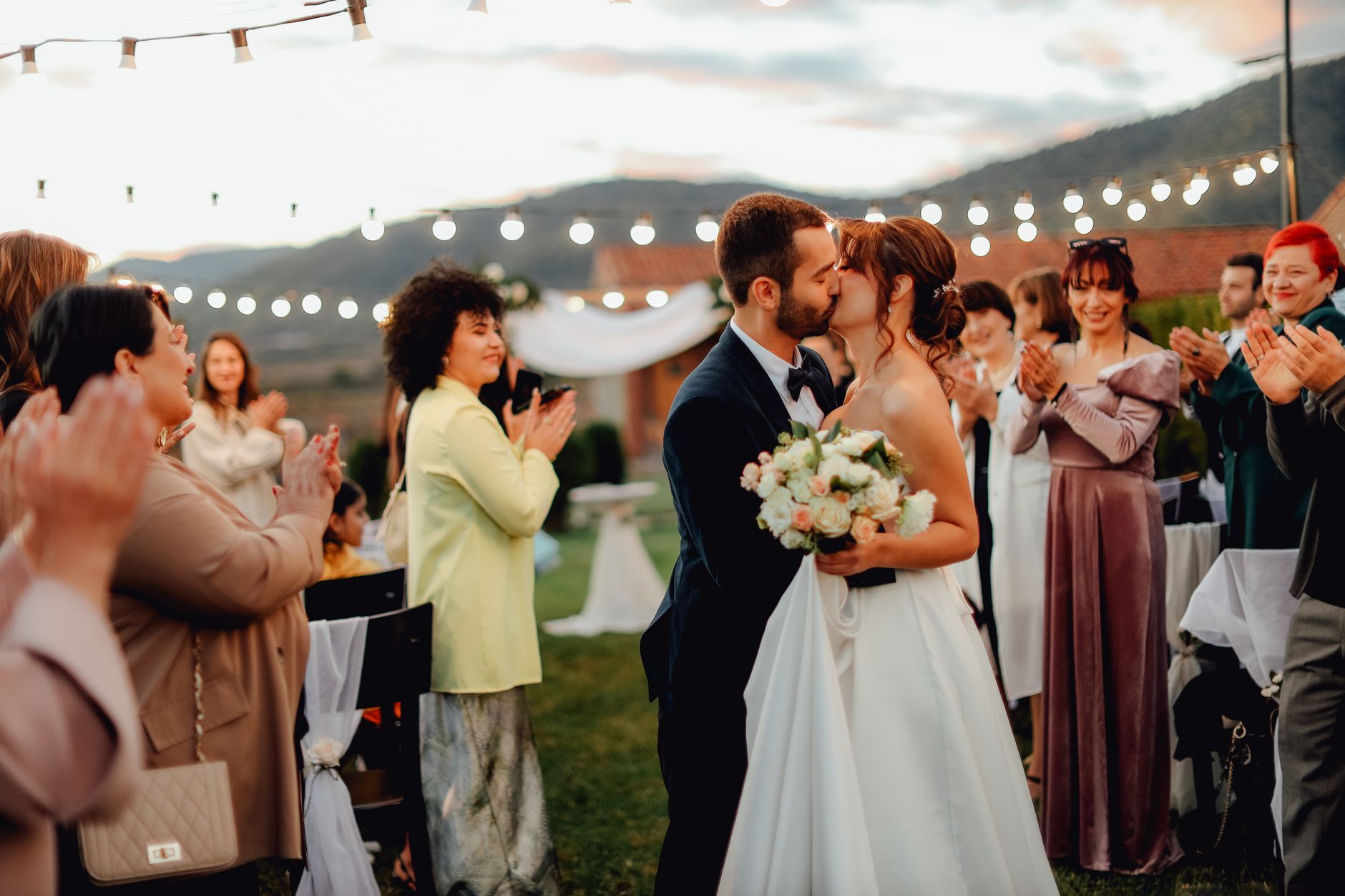 Family guests celebrating together at a wedding during a UK visit