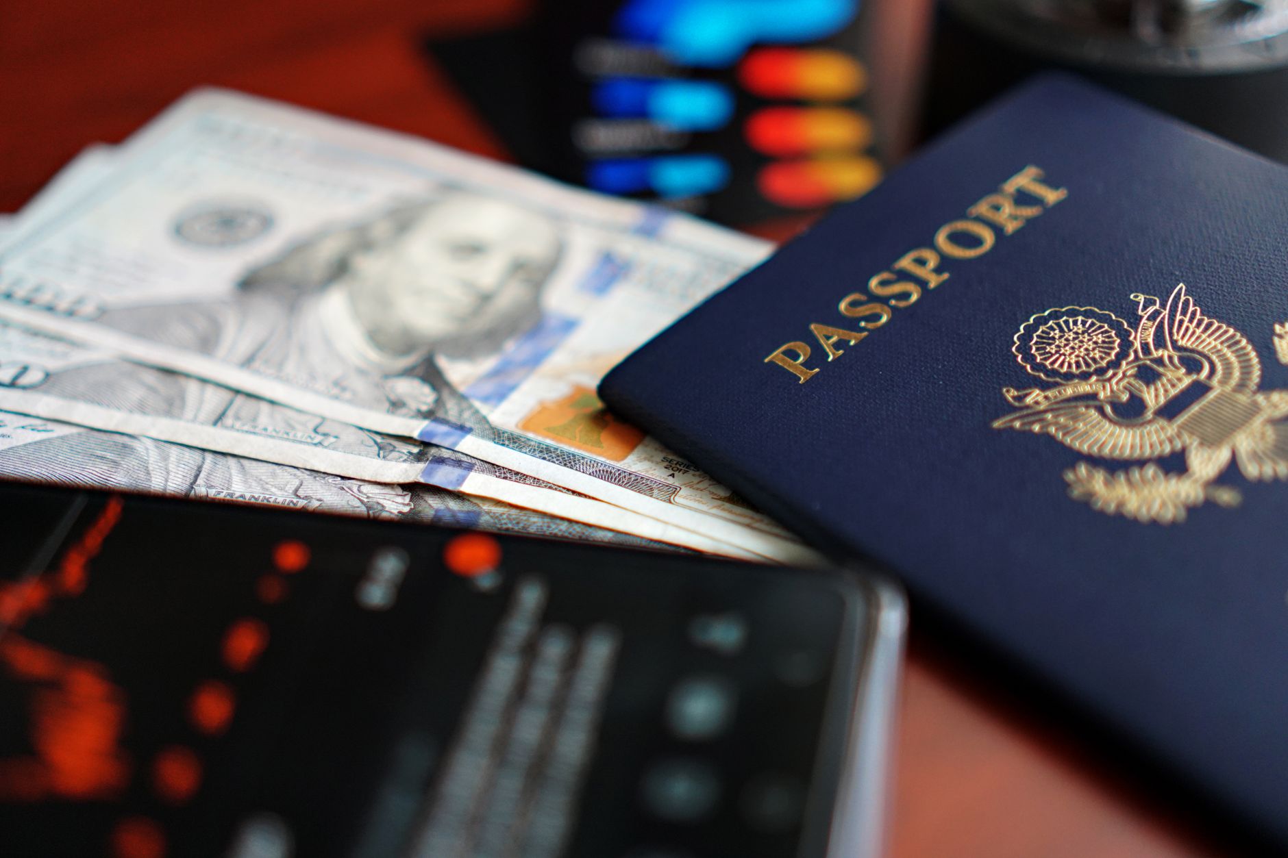 UK border control desk where an officer checks an arriving traveler's passport