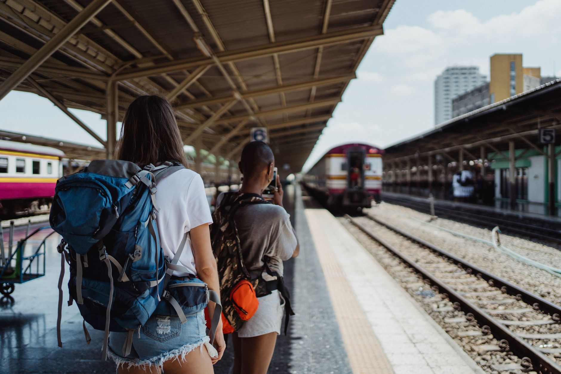 Young American backpacker with a rucksack continuing a trip beyond the United Kingdom